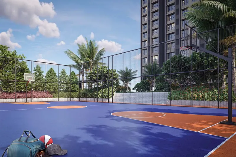 Outdoor basketball court on the podium with a tower behind