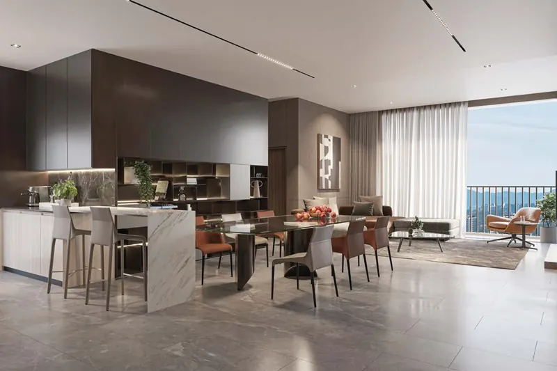 Open kitchen and dining area of a show unit with a city view
